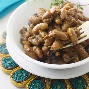 A dish of baked beans made from dry beans in the oven.