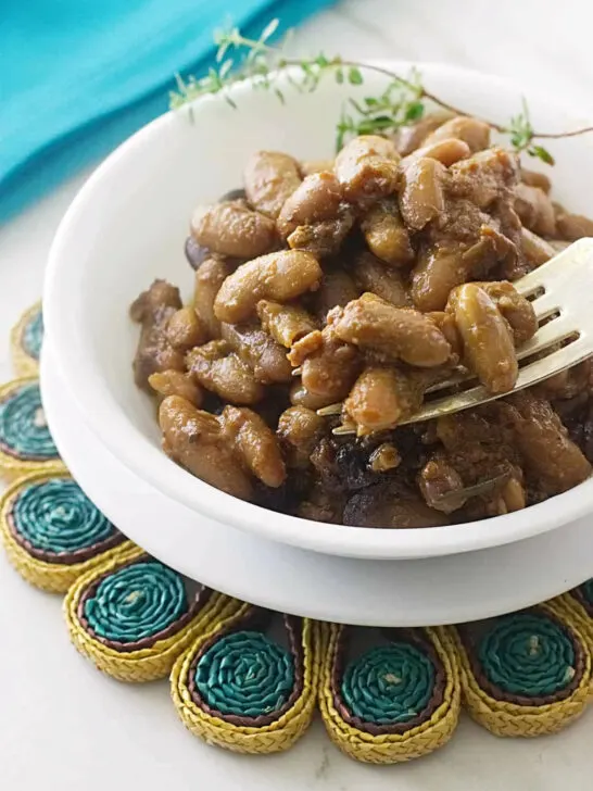 A dish of baked beans made from dry beans in the oven.