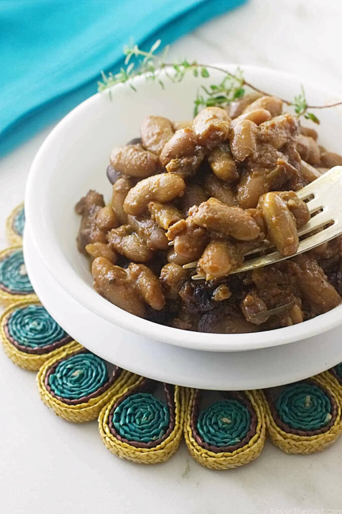 A dish of baked beans made from dry beans in the oven.