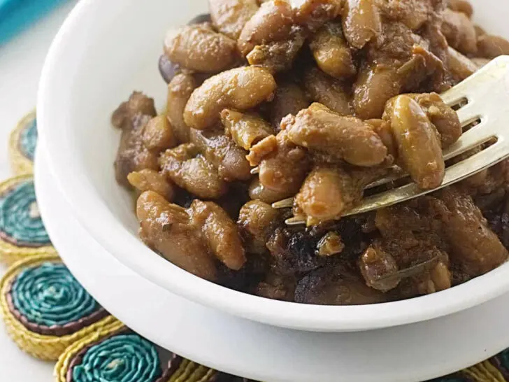 A dish of baked beans made from dry beans in the oven.