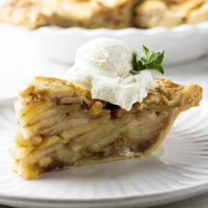 Spiced apple pie with a scoop of ice cream on top.