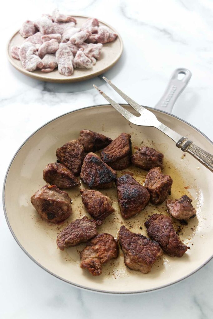 Searing the lamb cubes for stew.