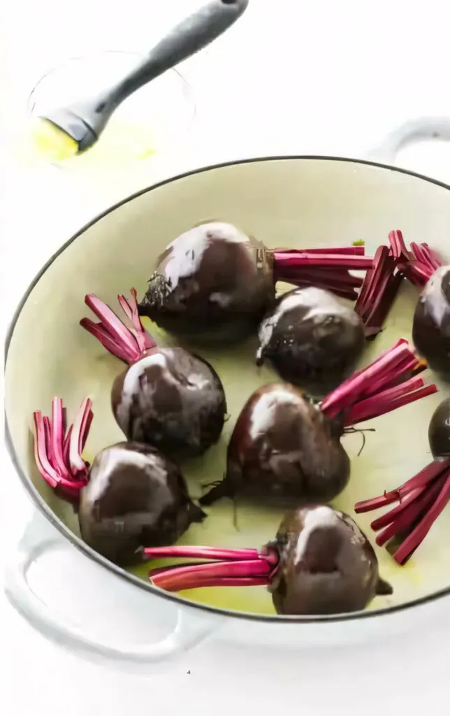 Prepping beets to roast in the oven.