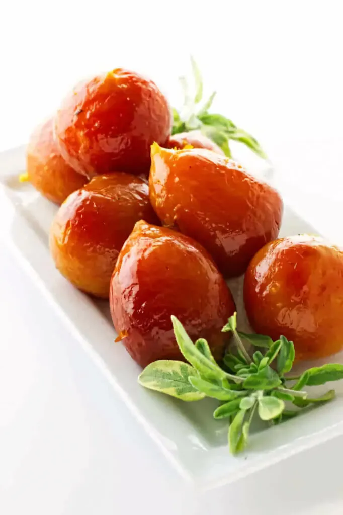 A plate with roasted golden beets.