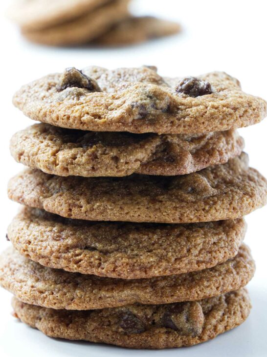 A stack of six whole wheat spelt chocolate chip cookies.