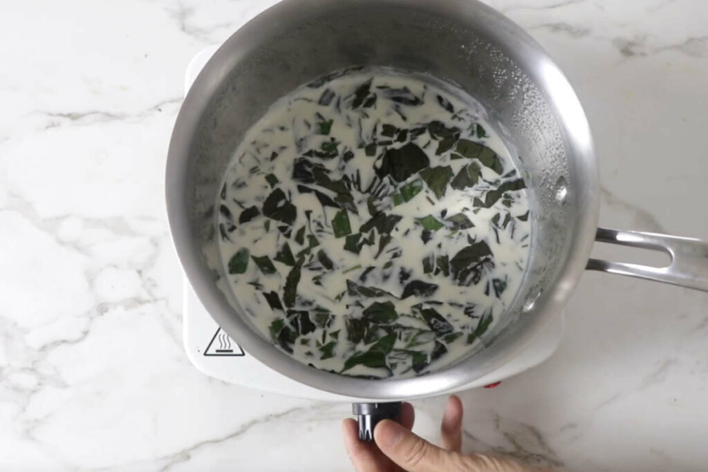 Infusing basil in milk.