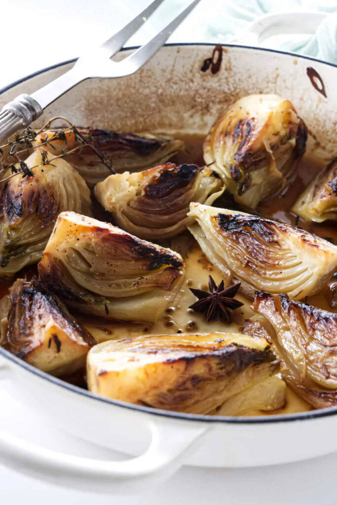 A pan filled with caramelized fennel and spices.