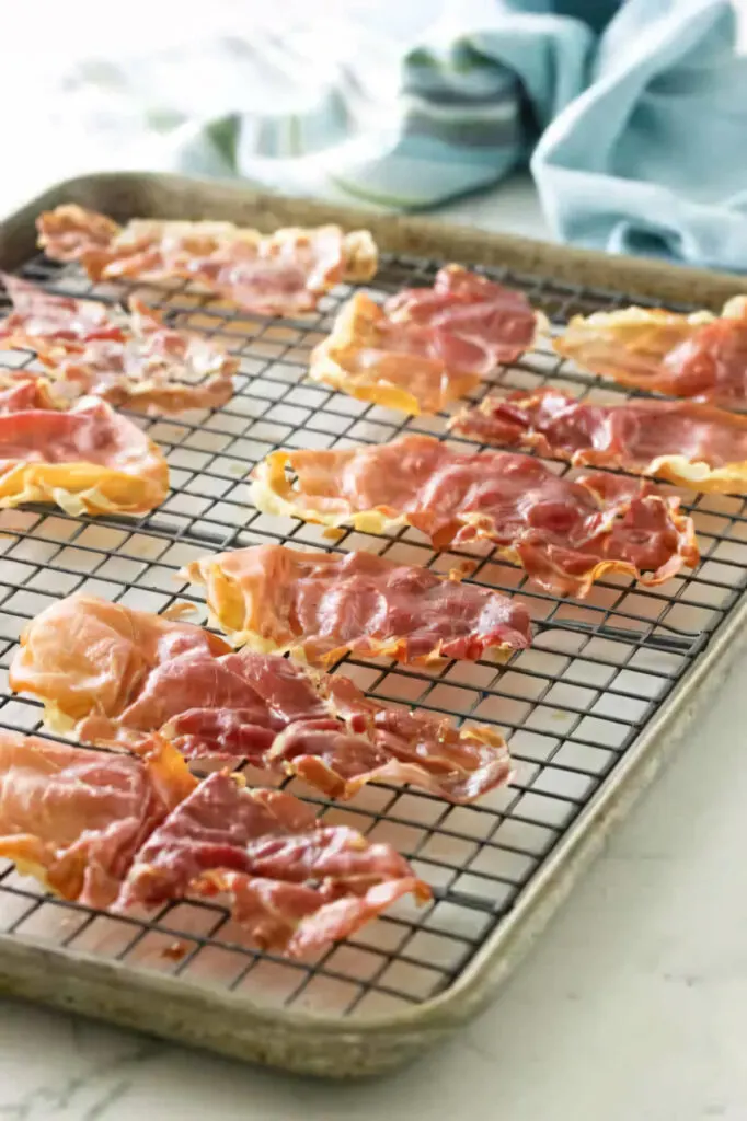 Crispy prosciutto on a baking rack.