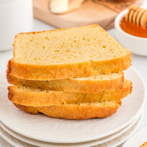 Four slices of sandwich bread made with einkorn flour on a plate.