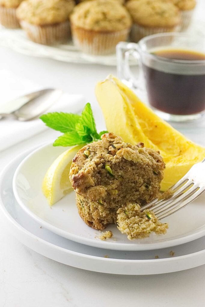 A fork next to a zucchini muffin made with kamut flour.