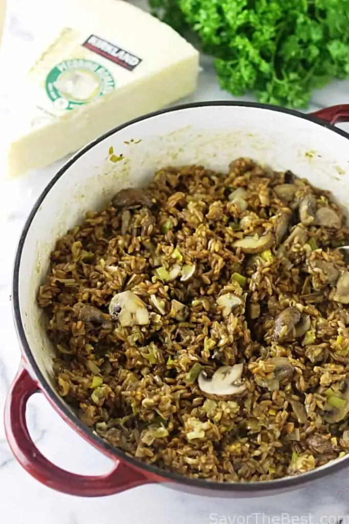 A Dutch oven filled with mushroom farotto.