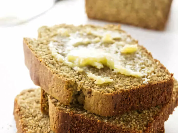 Several slices of barley bread on a counter.