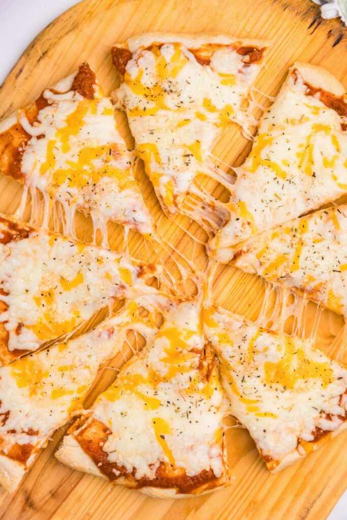 A cheese pizza sliced into 8 sections.