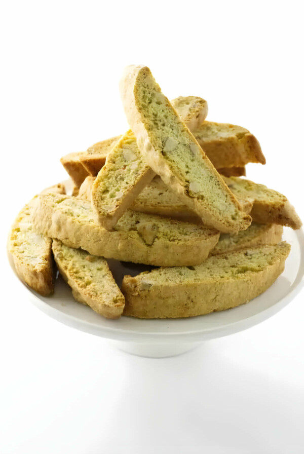 A serving platter filled with almond biscotti cookies.