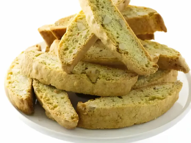 A serving platter filled with almond biscotti cookies.