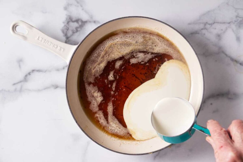 Making the maple cream sauce in a pan.