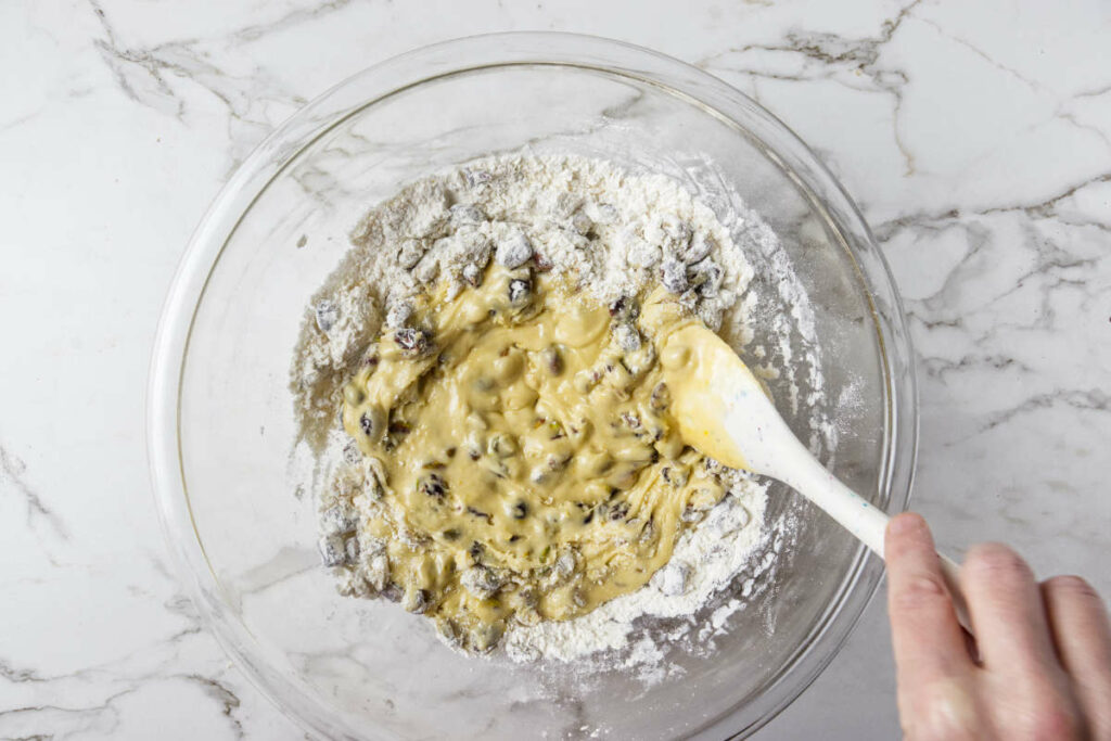 Stirring the cookie dough with a spatula.