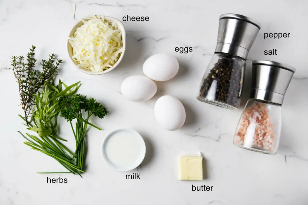 Ingredients used to make a herb and cheese omelette.