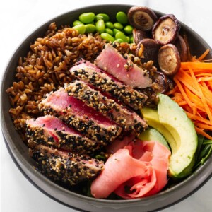 A ahi tuna bowl recipe with veggies and pickled ginger.