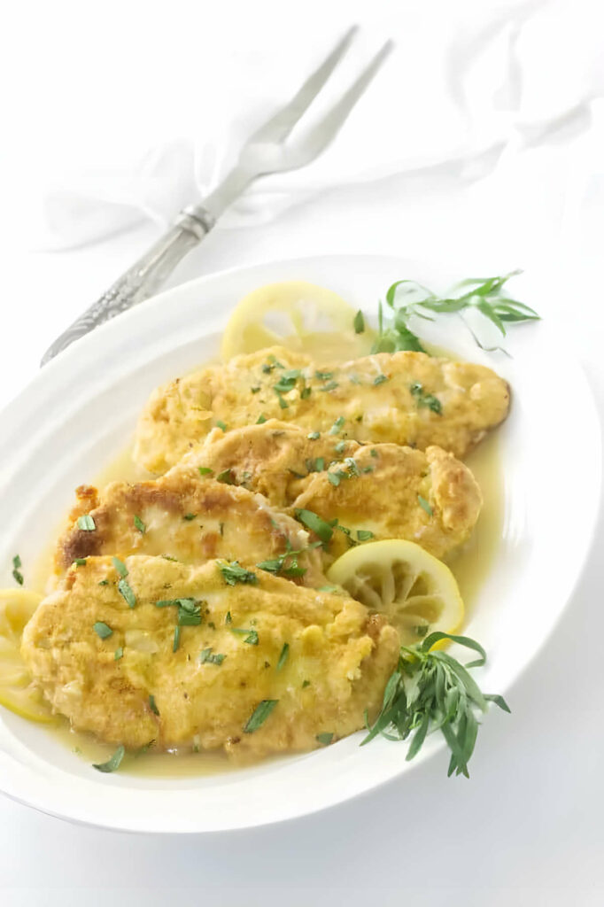 Chicken francese battered chicken on a platter.