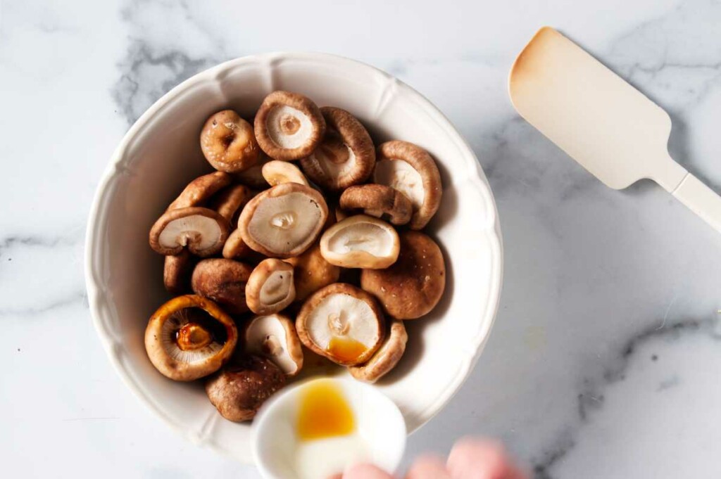 Prepping mushrooms for tuna steak bowls.