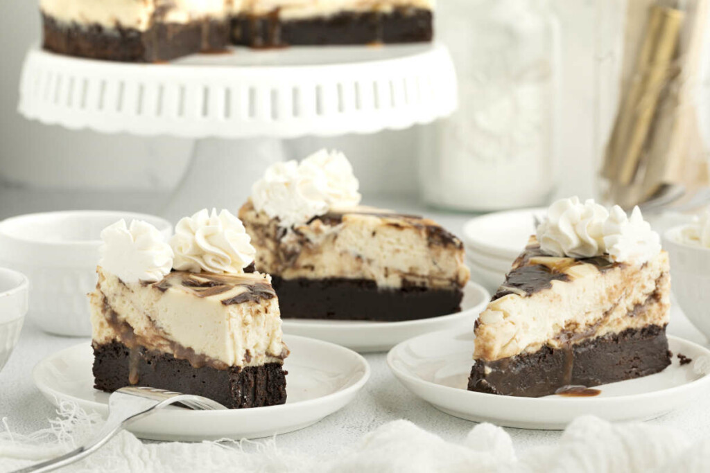 Three slices of brownie bottom cheesecake.