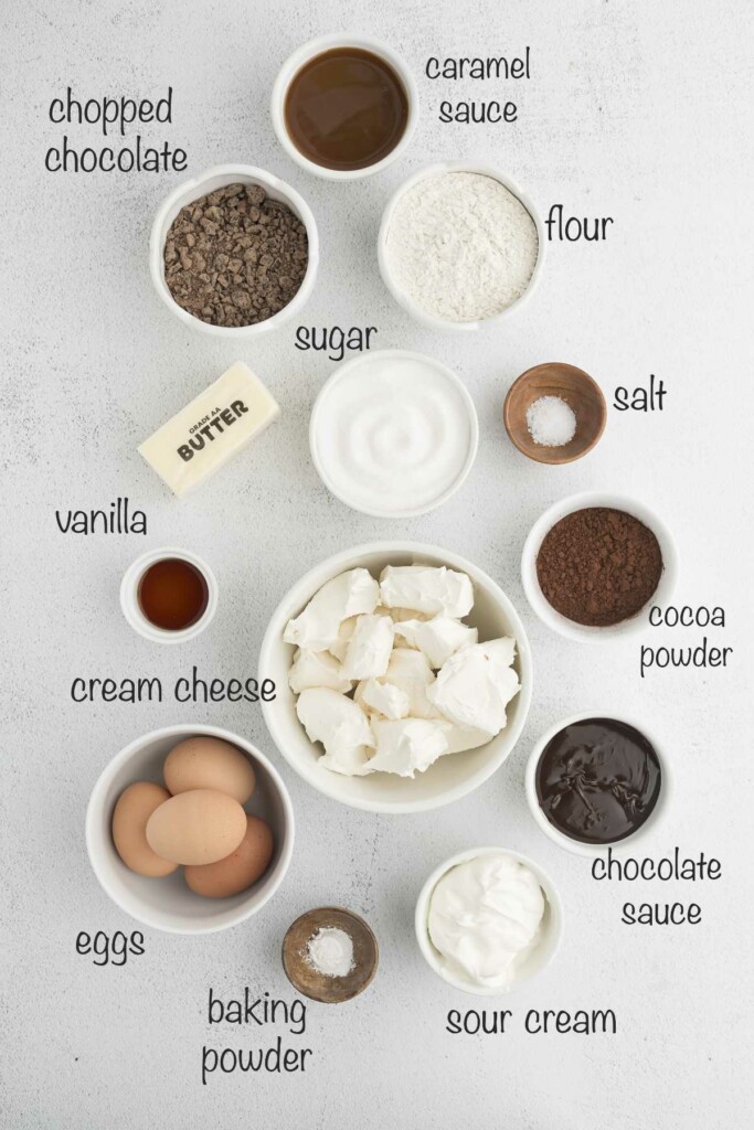 Ingredients used to make a cheesecake with a brownie bottom.