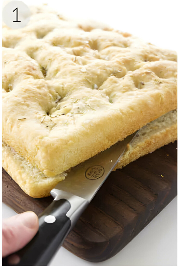 Slicing focaccia in half to make a sandwich.