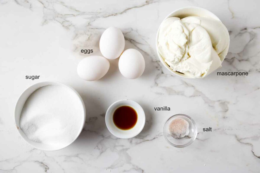 Ingredients used to make a ricotta filling for the cake.