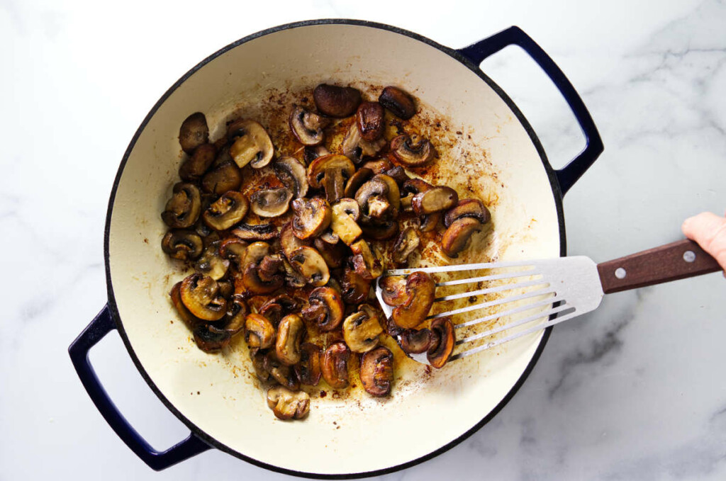 Cooking mushrooms to make sauces for chicken breast.