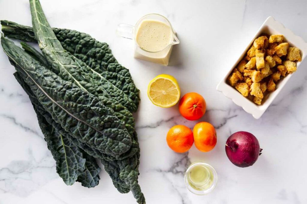 Ingredients used to make a mandarin kale salad.