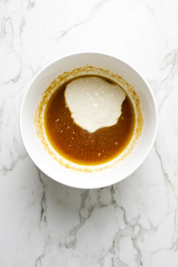 Bowl with brown sugar, melted butter, and sourdough discard.