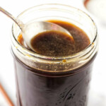 A pint jar filled with homemade sauce for fried rice.