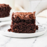 A slice of sourdough chocolate cake on a dessert plate.