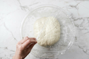 Covering the dough for a bulk ferment.