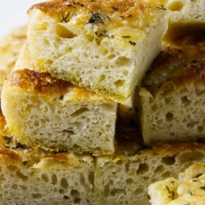 A stack of focaccia bread slices made with sourdough starter.