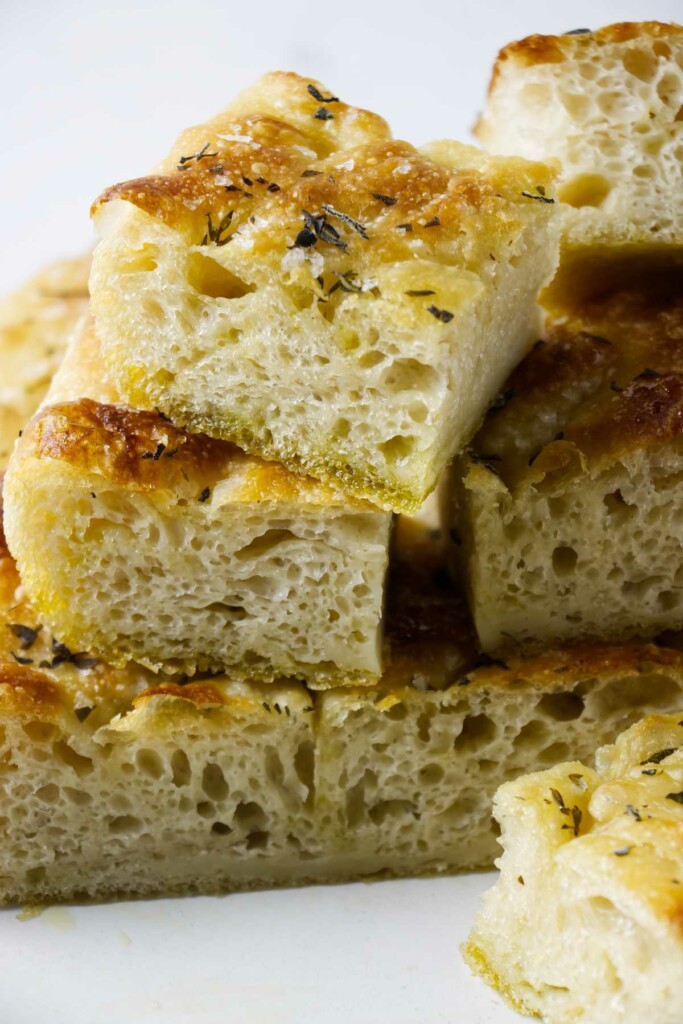 A stack of focaccia bread slices made with sourdough starter.