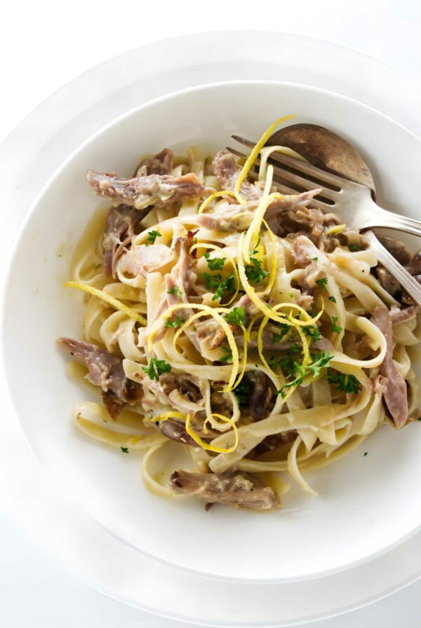 Tagliatelle pasta with shredded duck meat.