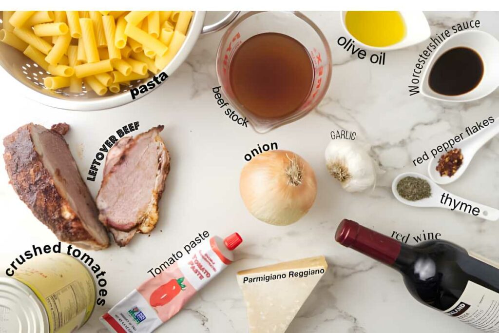 Beef pasta ingredients neatly arranged on a white background.