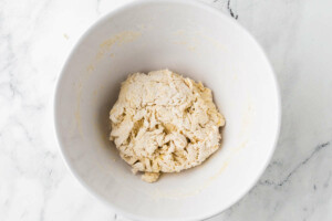 Mixing dough for sourdough flatbread recipe.