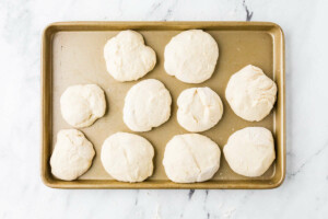 Dividing dough into 10 rounds for sourdough starter flatbread.