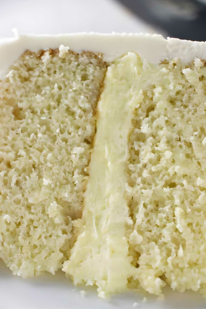 Close-up of moist vanilla layer cake with vanilla mousse filling.