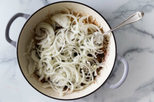 Sauteeing onions in a skillet.