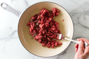 Cooking ground beef in a skillet.