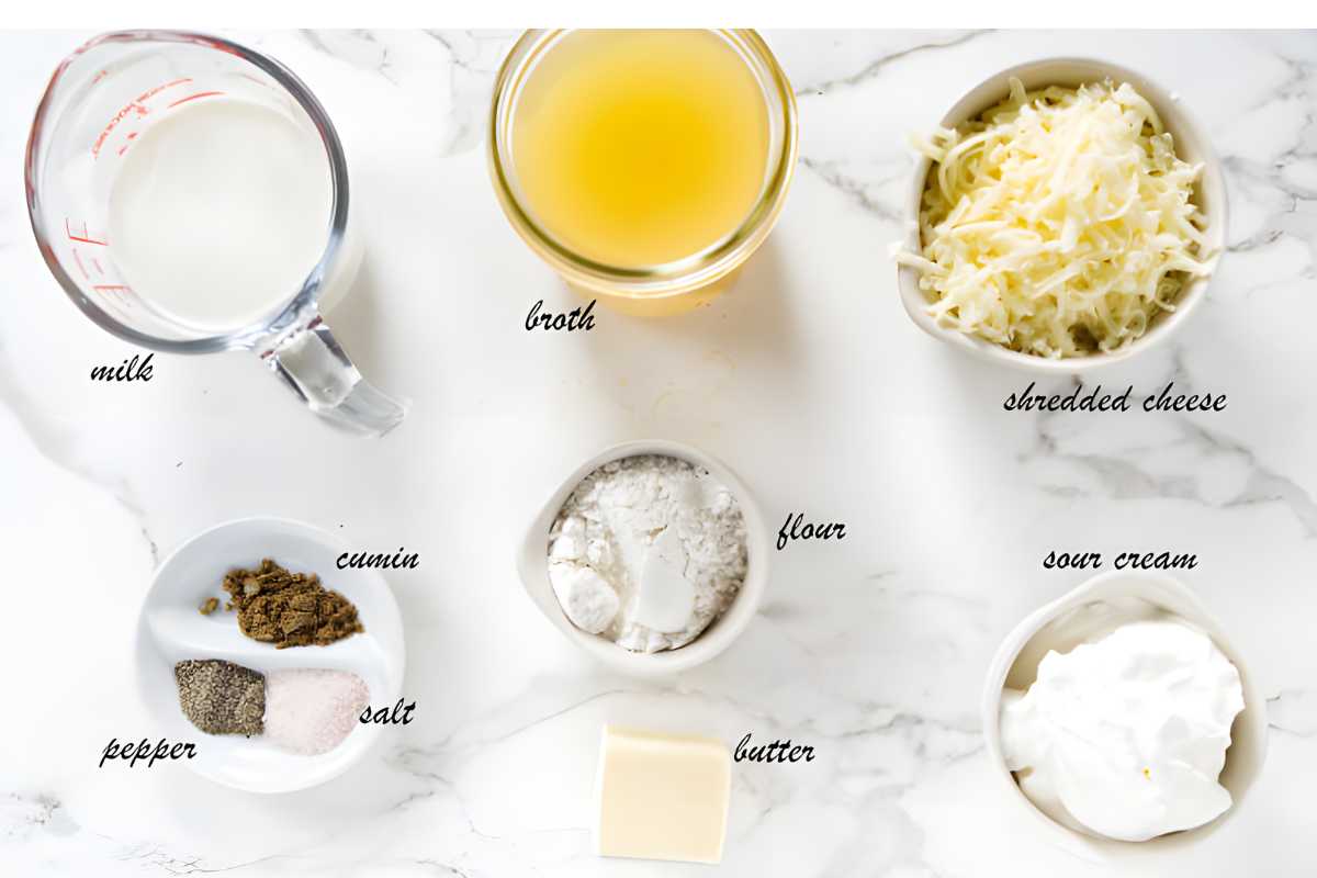 Labeled ingredients for cooking arranged white enchilada sauce.