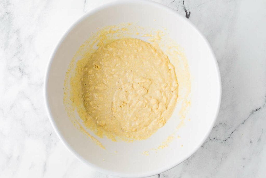 Making the batter for sourdough cornbread.