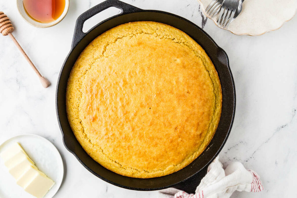 A skillet with freshly baked fermented cornbread.