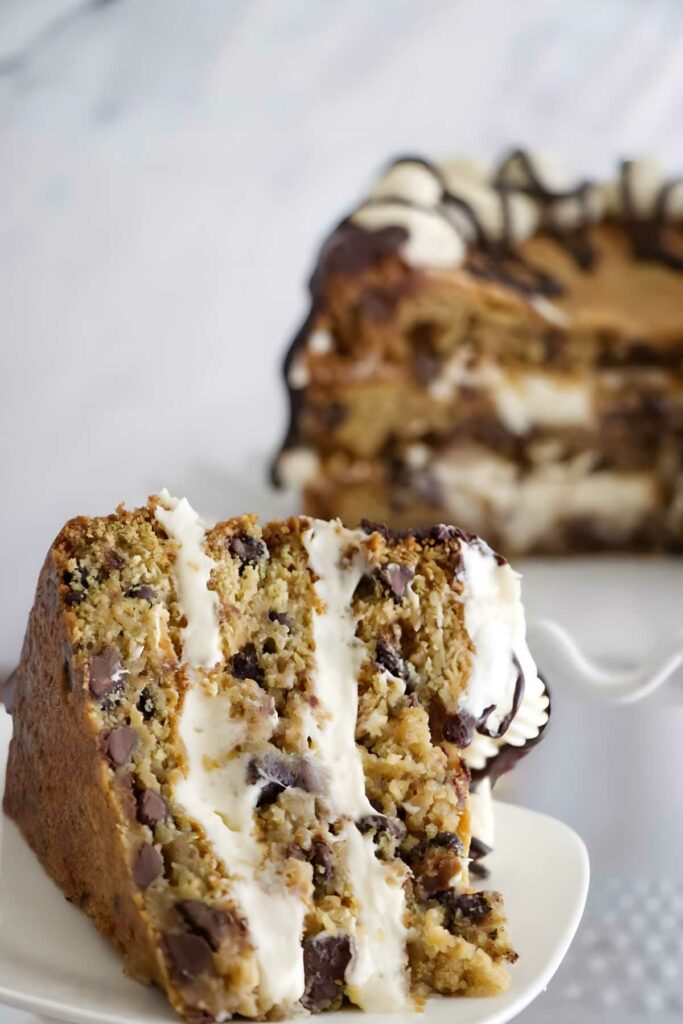Close-up of cookie cake slice with chocolate chips.