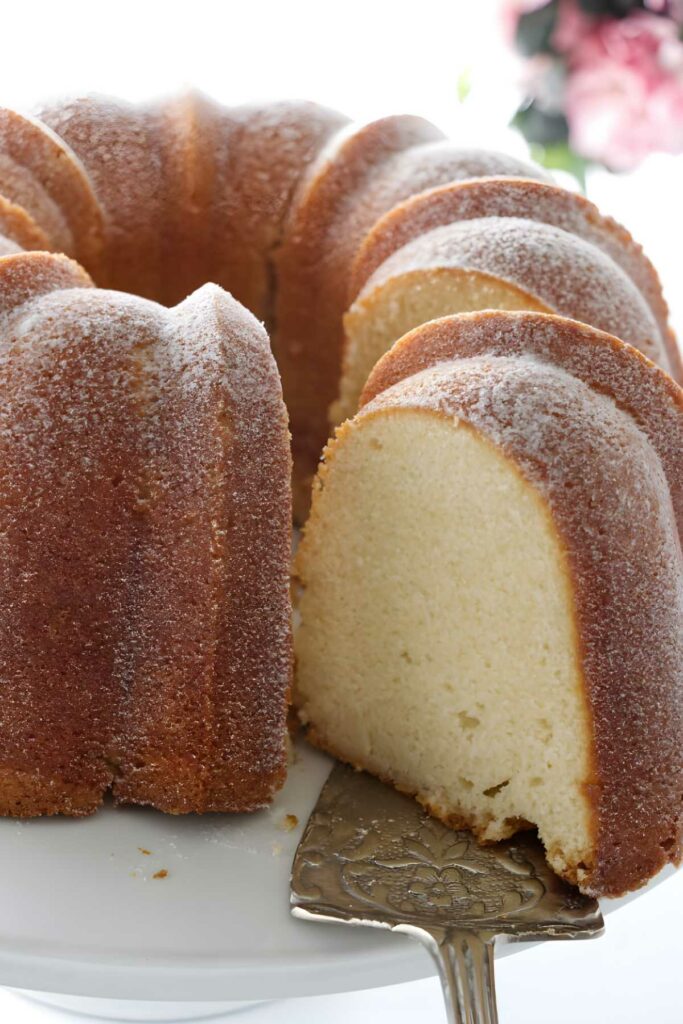 Pound cake slice being served.