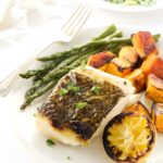 Grilled sea bass with sweet potatoes, asparagus.